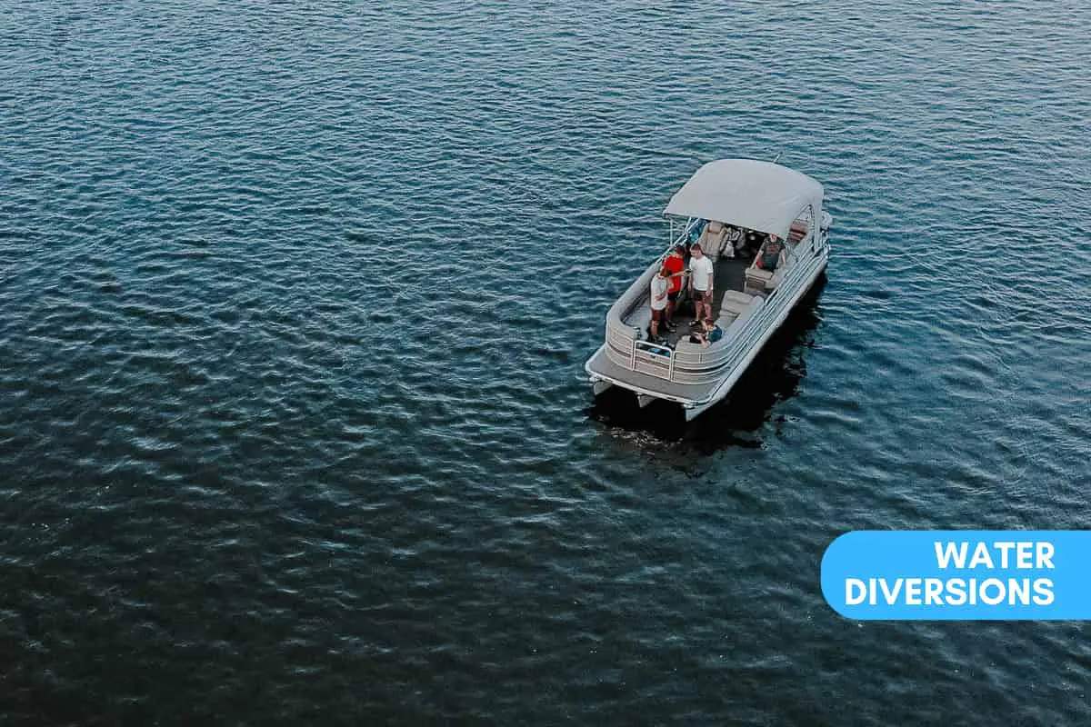 Pontoon boat out on open and calm water